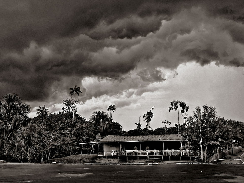 Stormy clouds cover the Amazonian jungle